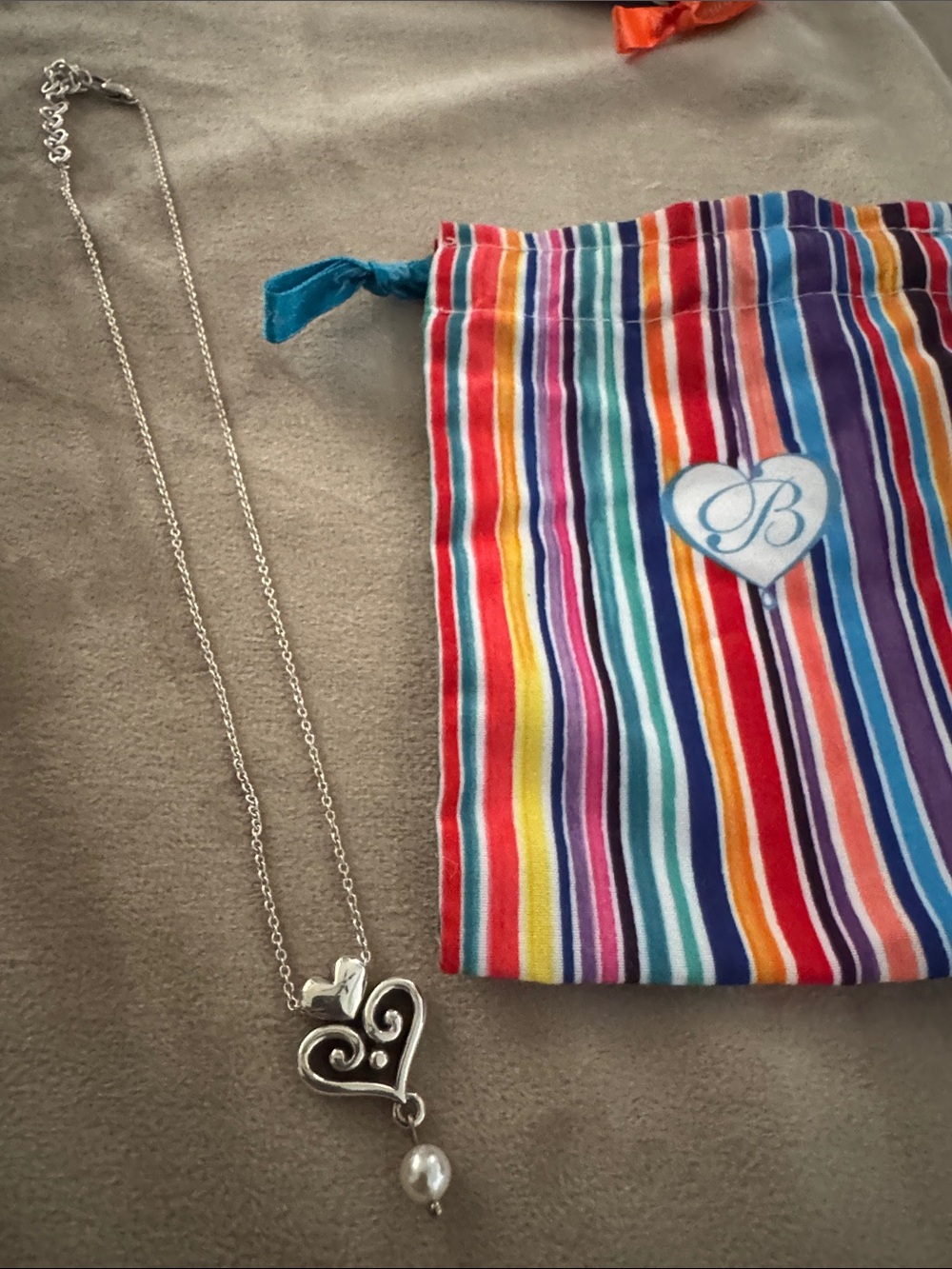 Brighton silver heart pendant necklace with pearl and striped pouch